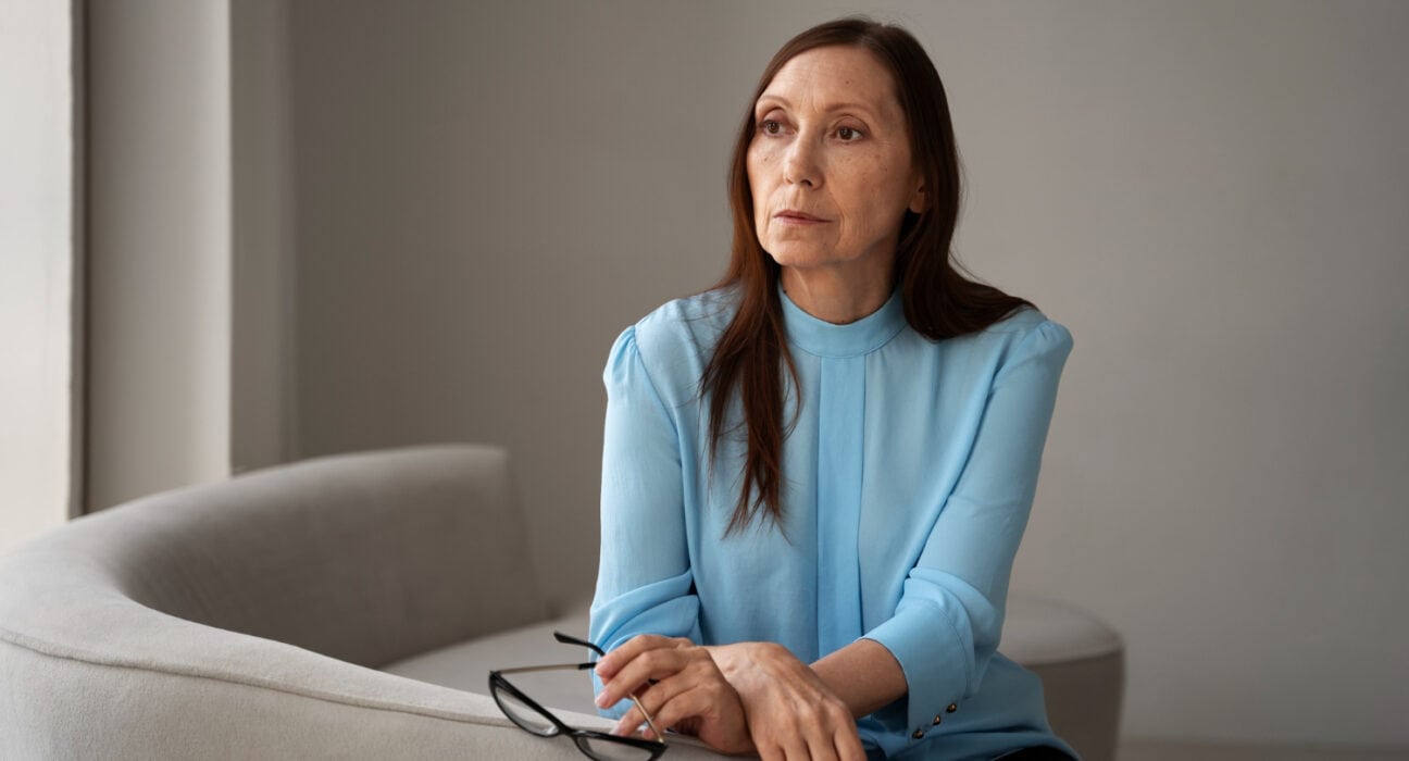 Woman reflecting on emotional stress and unhealthy relationship warning signs
