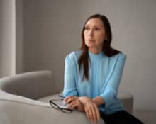 Woman reflecting on emotional stress and unhealthy relationship warning signs